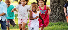 Early Years children playing outside