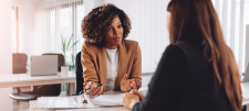 Women advising another female