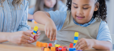 Girl with counting blocks