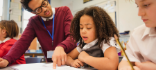 Teacher with pupils in class