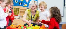 early years teacher with children