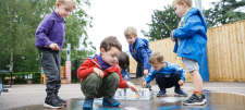 Children playing in puddle