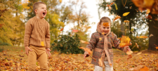 Children playing in leaves