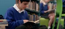 The long tail of whole class guided reading Blue in blue school uniform reading a book