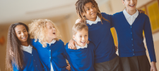 children in blue uniforms