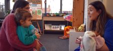 Child and carer in classroom