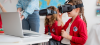 girls using virtual reality headsets