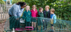 teacher with a group of children outside
