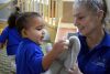 Child and carer playing