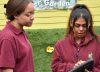 Care workers looking at tablet