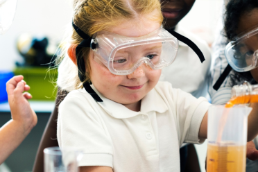 School girl conducting science experiment